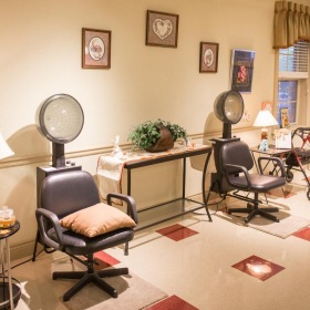 Everything within reach a room with a desk and chairs
