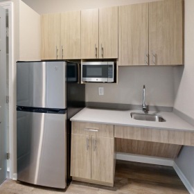 Kitchens with thoughtful details a kitchen with wooden cabinets