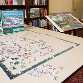 Love where you live a table with a board game on it